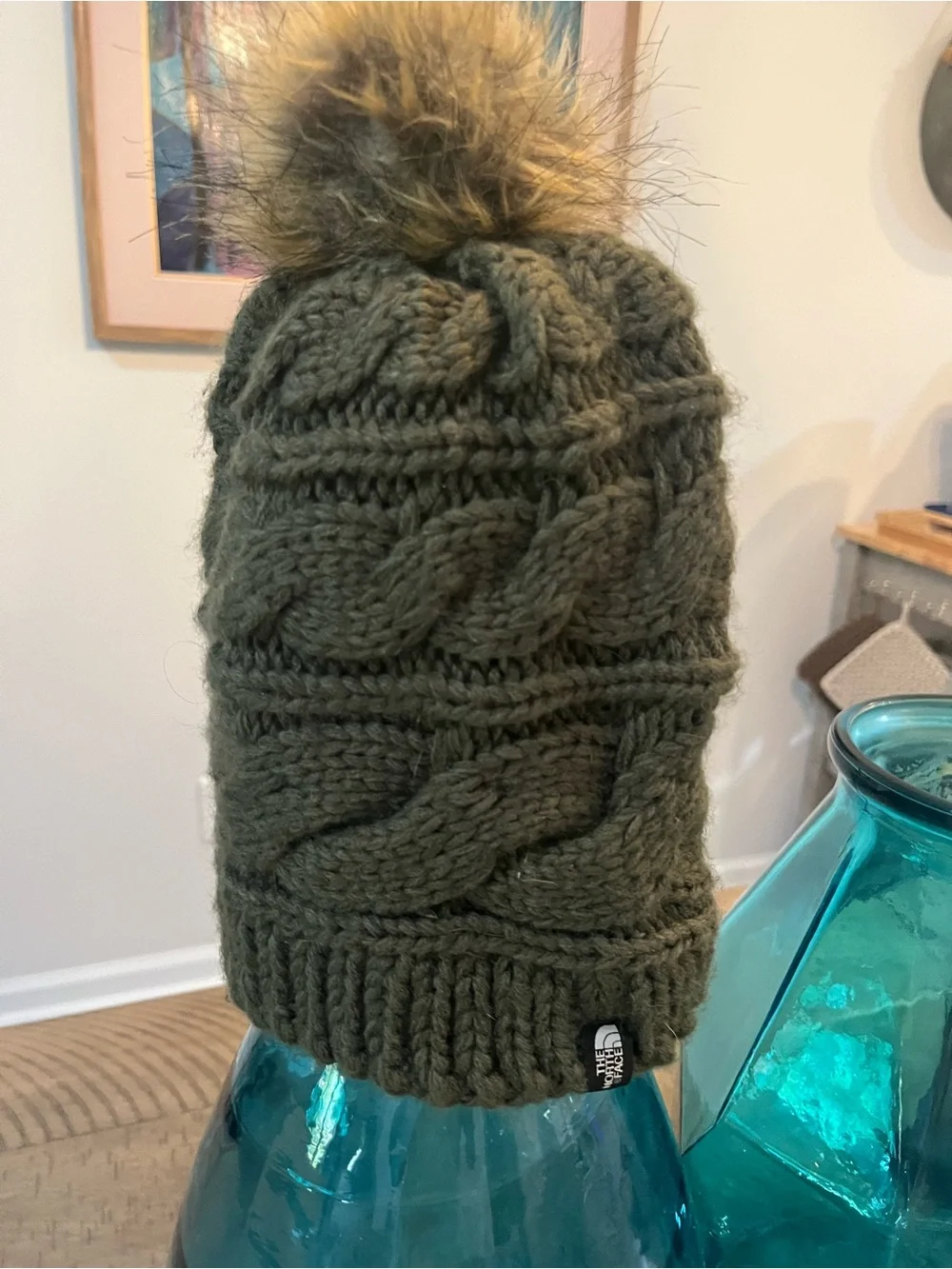 The North Face Olive Cable Knit Beanie with Faux Fur Pom